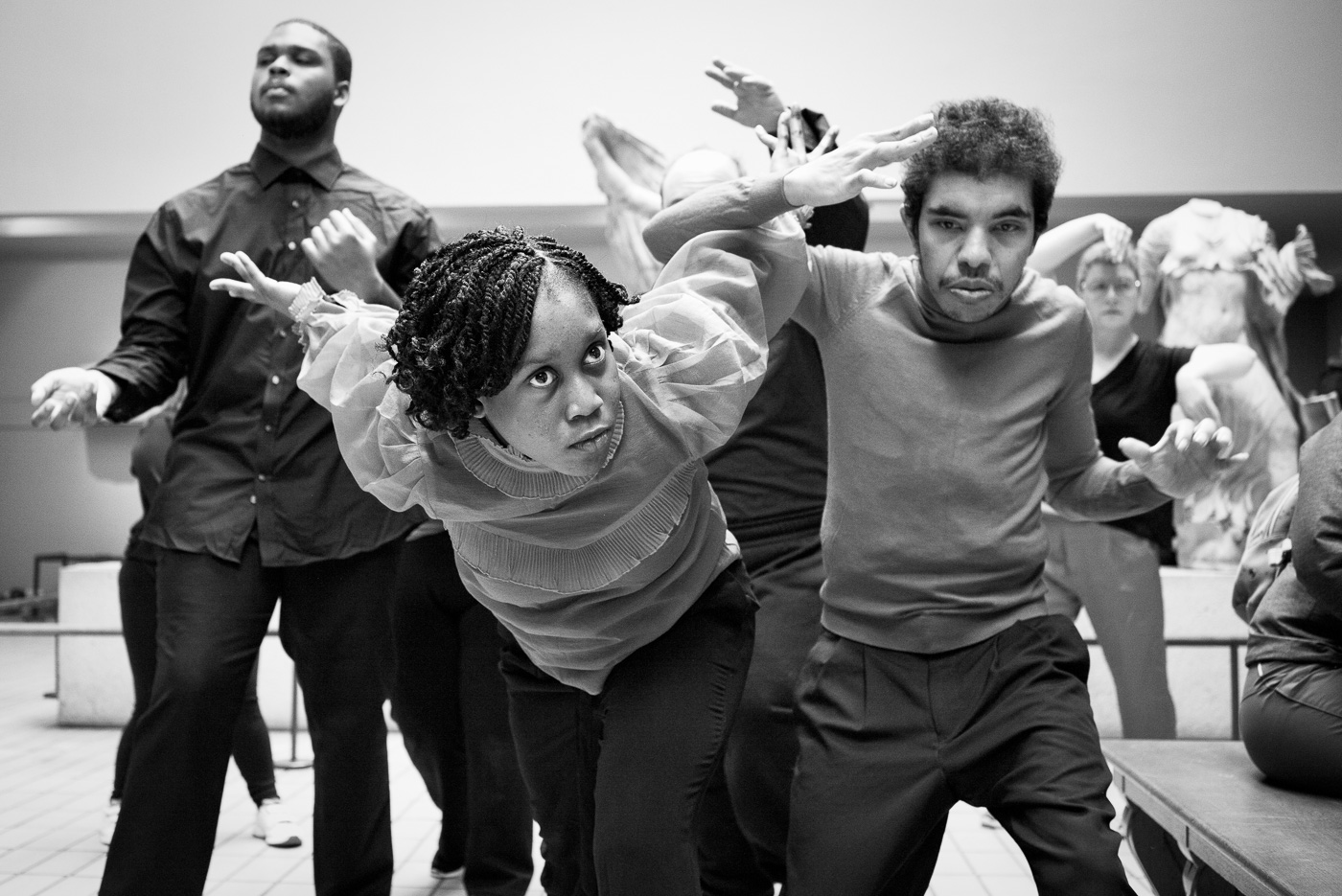 Black and white photo of Sheri dancing at the British Museum 